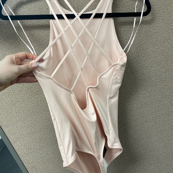 Express Cream Bodysuit with Criss-Cross Straps - Picture 2 of 7